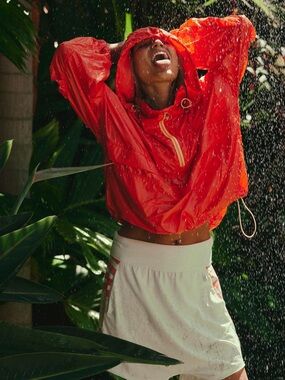 FP Movement Spring Showers Packable Rain Jacket Heat Wave M